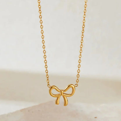 Golden Ribbon Charm Necklace