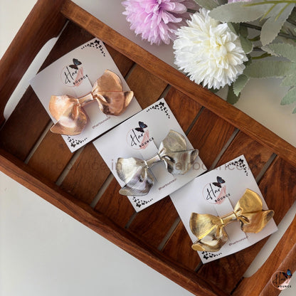 Glam Bow Metallic Hair Clip – Luxe Statement Collection