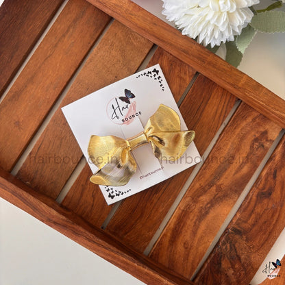Glam Bow Metallic Hair Clip – Luxe Statement Collection
