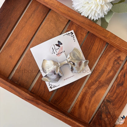 Glam Bow Metallic Hair Clip – Luxe Statement Collection