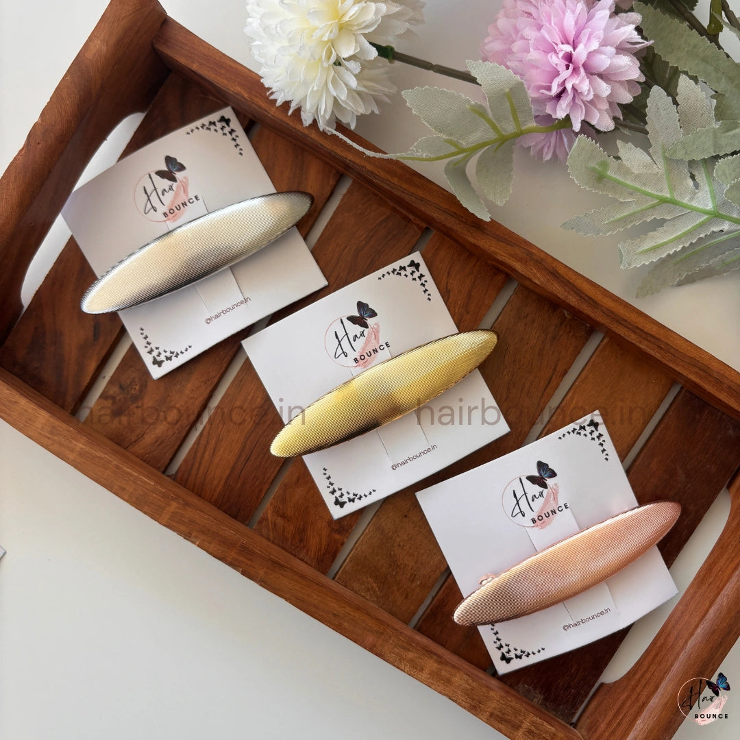 Celestia Micro-Rib Metallic Oval Barrette – Refined Luxe Collection