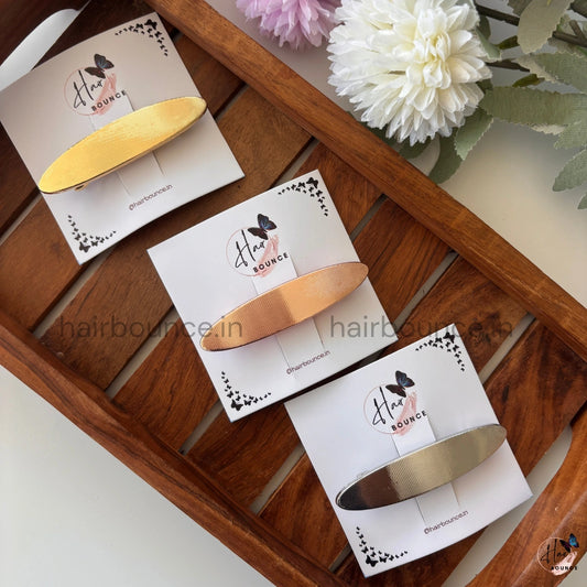 Elara Sleek Metallic Oval Barrette – Minimal Luxe Collection