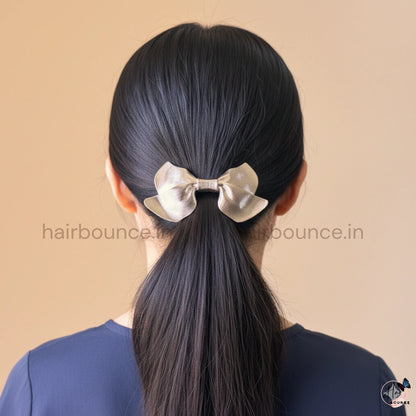 Glam Bow Metallic Hair Clip – Luxe Statement Collection