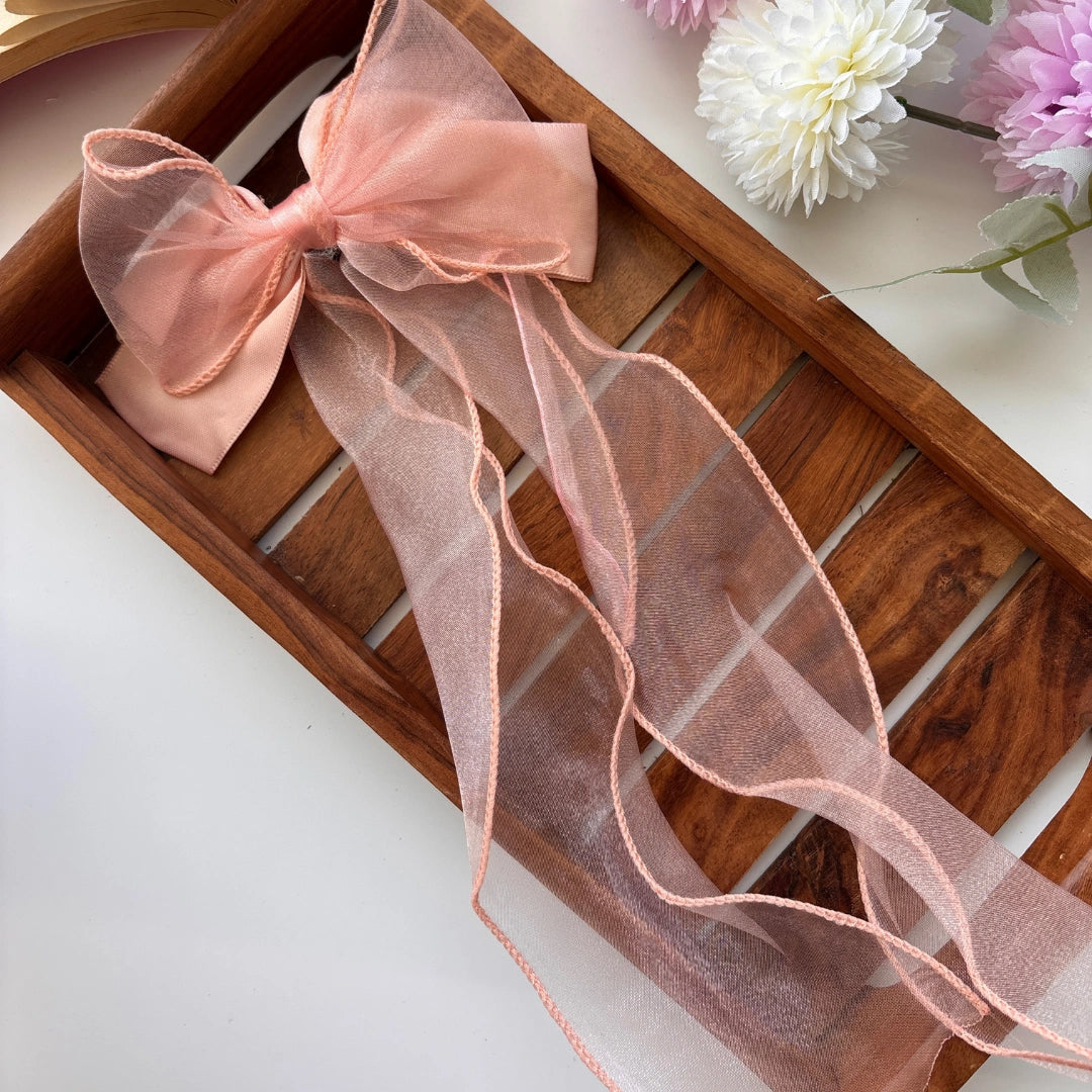Sheer Elegance Long Tail Bow Clip