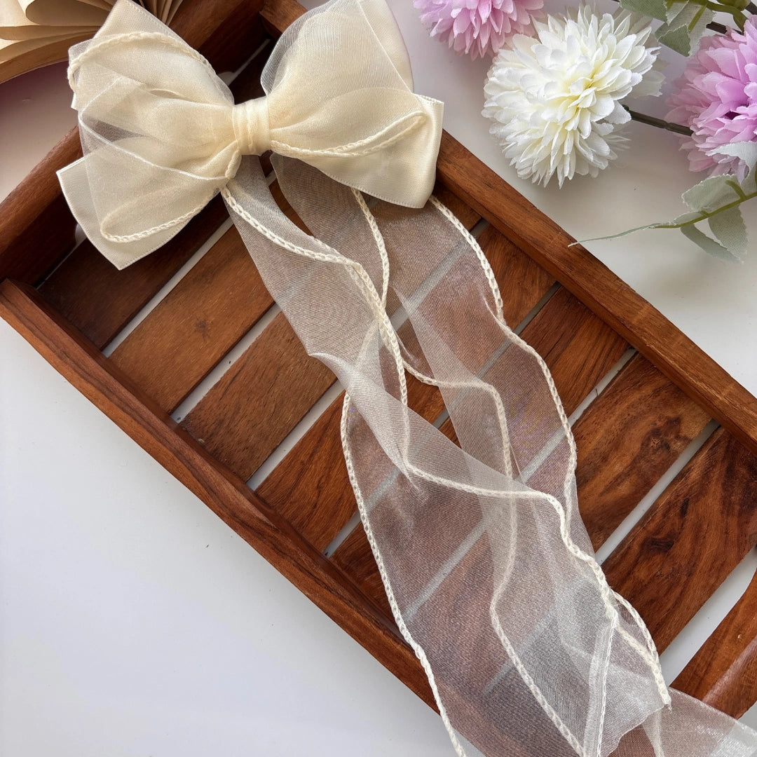 Sheer Elegance Long Tail Bow Clip