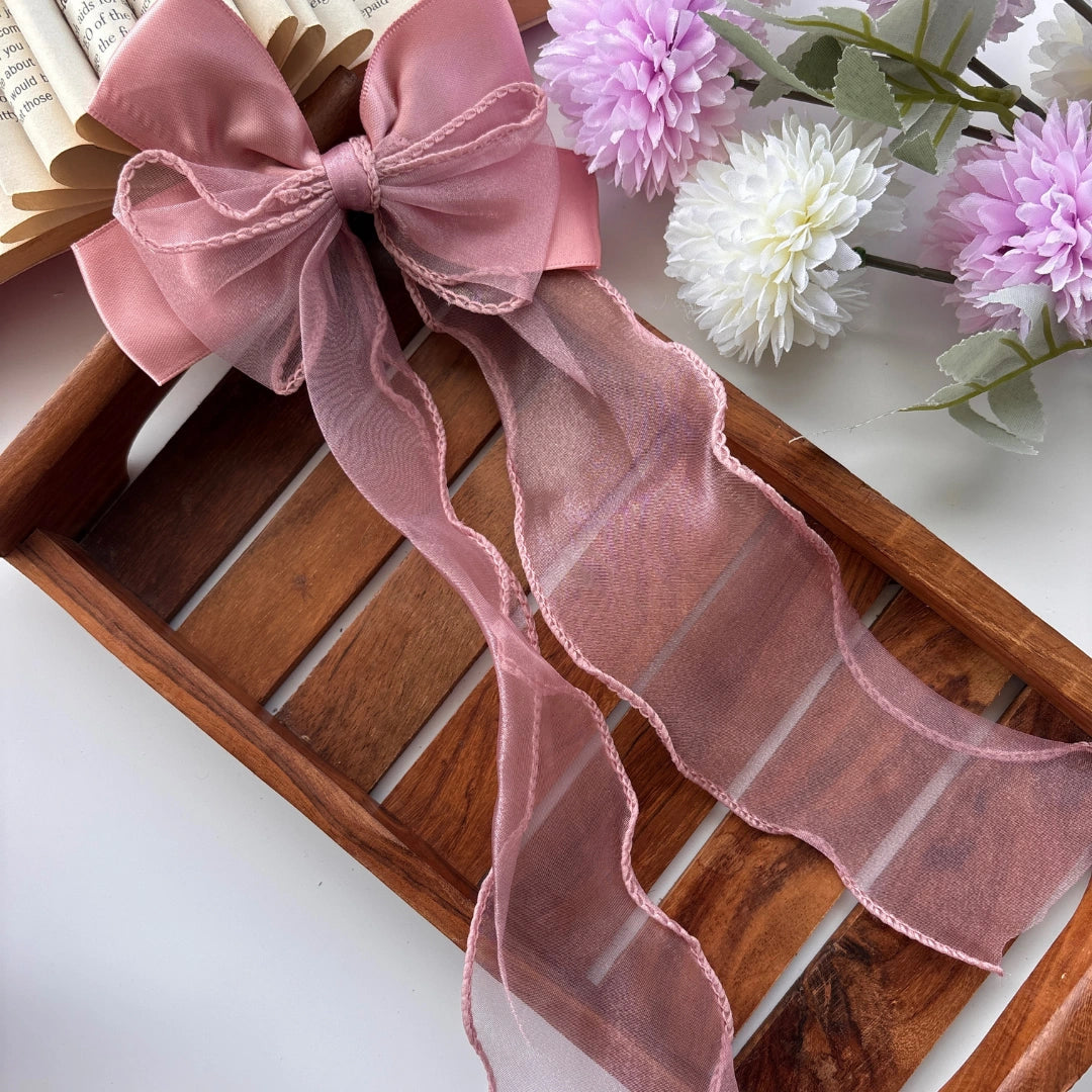Sheer Elegance Long Tail Bow Clip