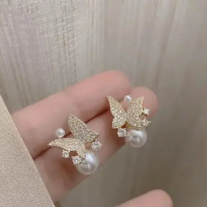 Butterfly pearl stud earrings